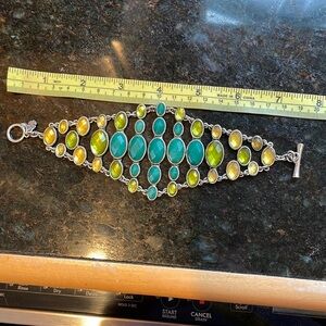 Lucky Brand Wide Bracelet
Faceted turquoise, Green, Yellow Faux Stone
